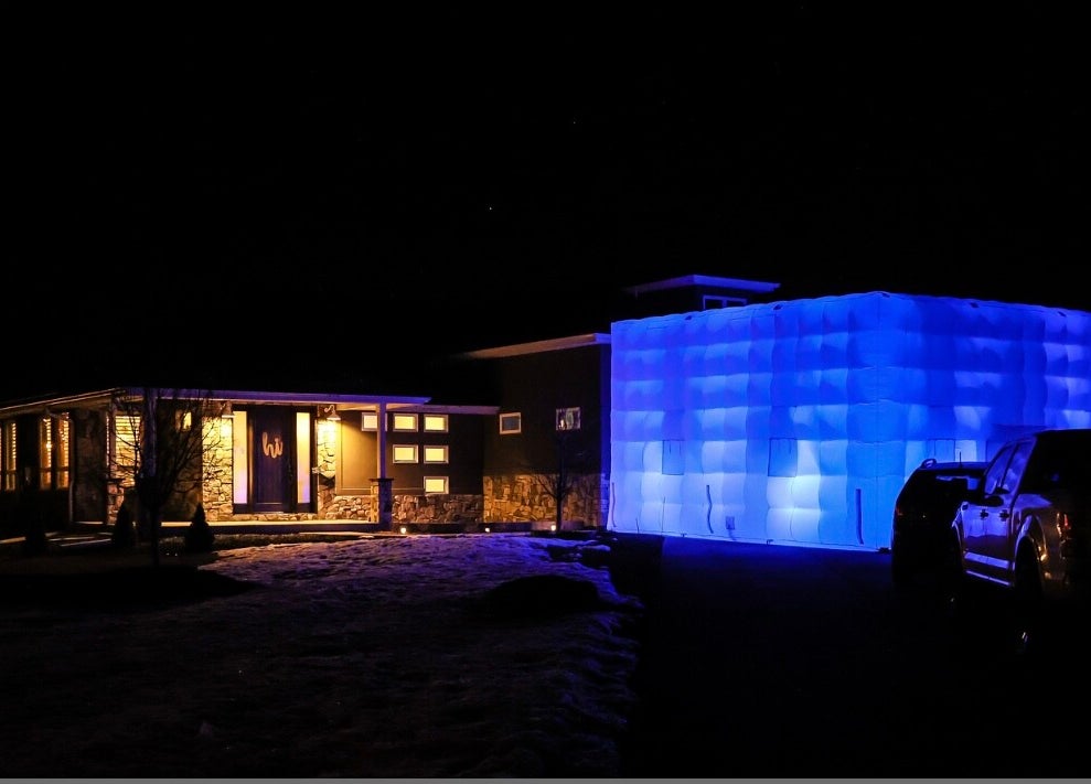 Inflatable nightclub glowing at night